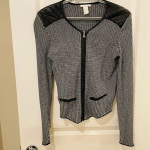 Black jacket with lightly worn faux leather shoulders